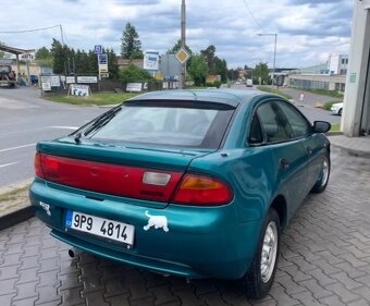 Mazda 323f 1.5 65 KW DOHC. Klima, el.okna, ALU kola - 11