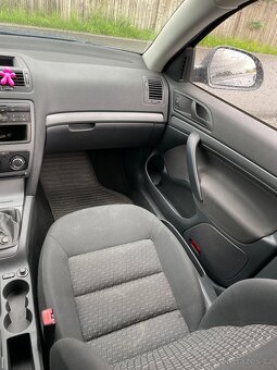 Škoda octavia 1.6 TDi 77 kw - 11