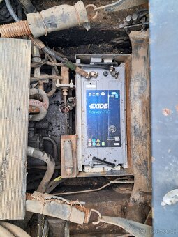 Prodám smykový nakladač UNC 750 - 11