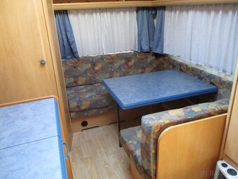 HOBBY 400 DE LUXE č. 214, Pevná postel. WC. Bojler. Stan - 11
