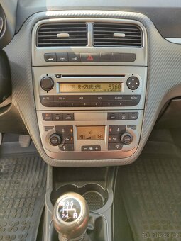 Fiat Punto Grande 1,2i 48KW,el.okna,servo,ALU,ABS. - 11