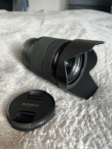 Objektiv Sony 28-70 mm f/3,5-5,6 OSS - 11