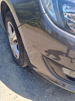 Opel Astra J kombi 1,4 - 11