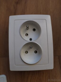 Vypínače, zásuvky, kryty vypinace - 11