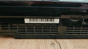 PlayStation 3 + 2 hry - 11