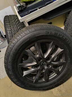 ALU kola Mazda CX3 5x114,3 r16 Originál, zimní pneu 6mm - 11