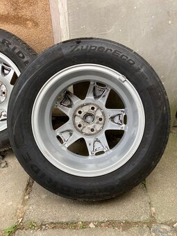 Alu kola 5x100 195/65 R15 - 11