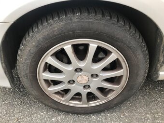 Nissan Almera 1.5i 66kw 2001 naj.142tis.km - 11