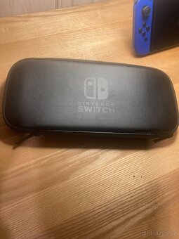 Nintendo switch OLED + hry a joy sticky na víc - 11