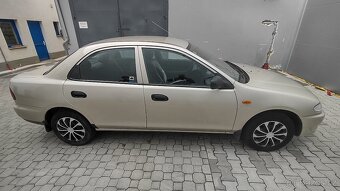 Mazda 323 BA sedan - velice pěkný stav - garážévaná - 11