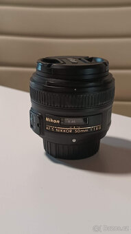 Zrcadlovka Nikon D7200 a hromada příslušenství - 11