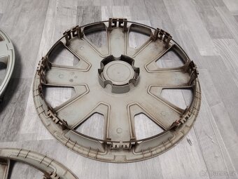 Poklice Ford, 4M51-1000-EB - 11