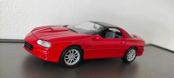 Modely aut 1/24 - Welly 1 - 11
