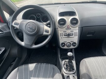 Opel Corsa 1,0i 44kw rok 2007-klima - 11
