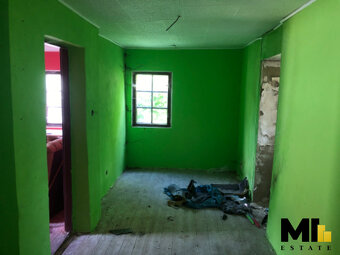 Prodej rodinného domu o velikosti 265 m2 na pozemku o veliko - 11