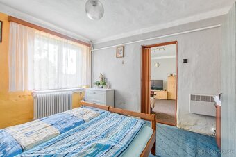 Prodej stavebního pozemku s rodinným domem v Lučině - 11