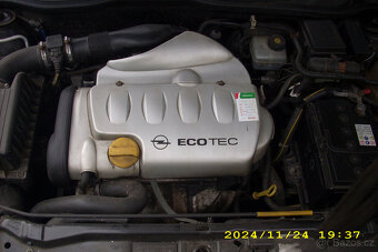 Opel astra caravan 1.8 - 11