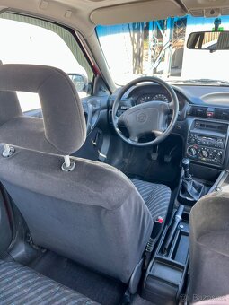 Opel Astra F 1,6i.  r.v. 1994,   83 tis. Km 1.maj. - 11
