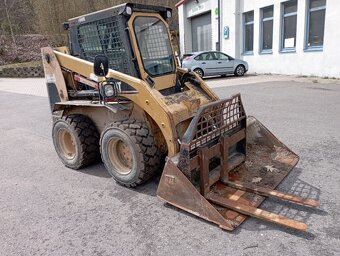 CAT 242 - 11