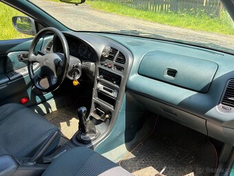Mazda 323F BA 1.8 - 11