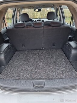Kia Carens 2.0 crdi - 11