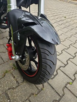 Benelli TNT 125 
 - 11