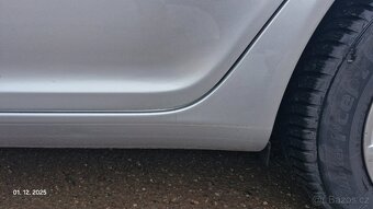 Octavia 2 facelift 1,6 TDi 77 kw, - 11