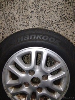 Nissan NV200 - zátěžová celoroční kola 14" - 11