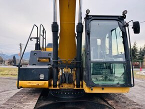 Pásové rypadlo Caterpillar 320W - 11