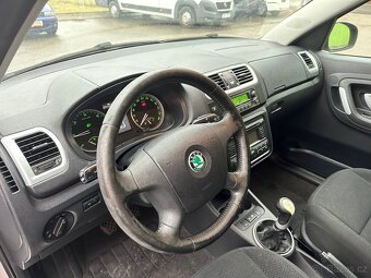 ŠKODA ROOMSTER 1.4TDi AMBITION - 11