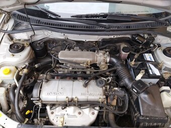 Mazda 323 BA - 11