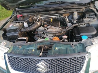 Suzuki Grand Vitara 4x4 1.6.78 kw- benzín. - 11