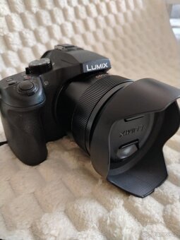 canon s objektivy a taškobatůžkem - 11