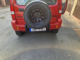 Prodám SUZUKI JIMNY 1.3/59kW, klimatizace - čistý vůz - 11