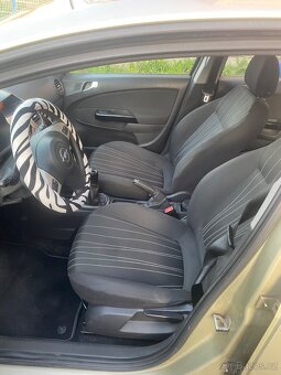 Opel Corsa 1.2i - 11