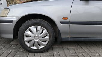 Honda Civic 6g 1.4i - 11