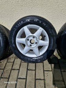 Kola škoda felicia r13 - 11