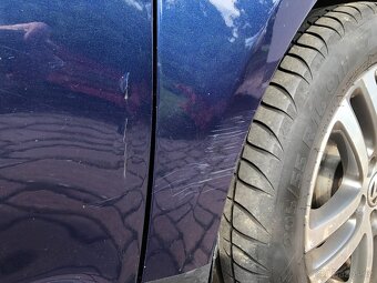 Volkswagen Touran 2.0 TDi BKD 103kw facelift - 11