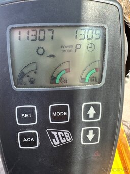 Kolový bagr JCB JS145w - 11