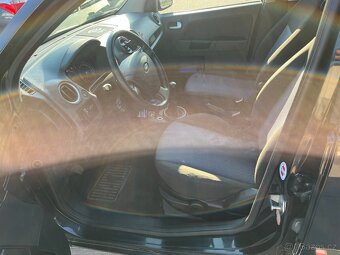 Ford Fusion 1.4 tdci - 11