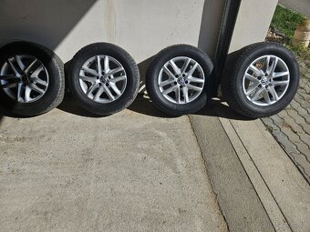 Litá kola VW Tiguan + letními pneu Barum 215/65 R16
- 11