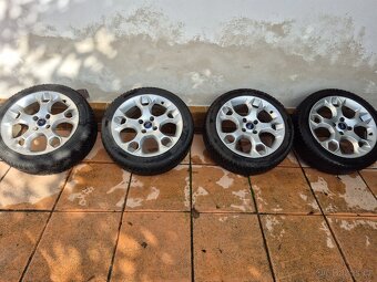 Prodám Alu disk Ford s pneumatikami Kumho SOLUS 4S HA32 - 11
