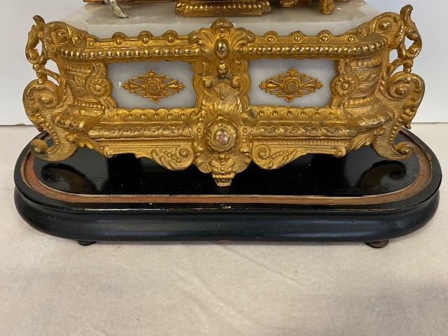 Figurární hodiny pod šturcem. - 12