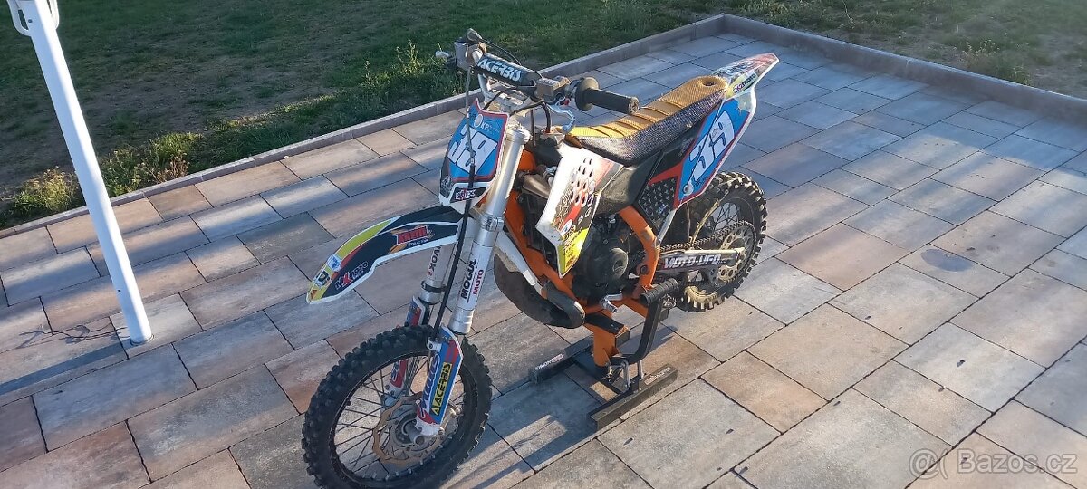 KTM 65 + náhradní díly + oblečení - 12