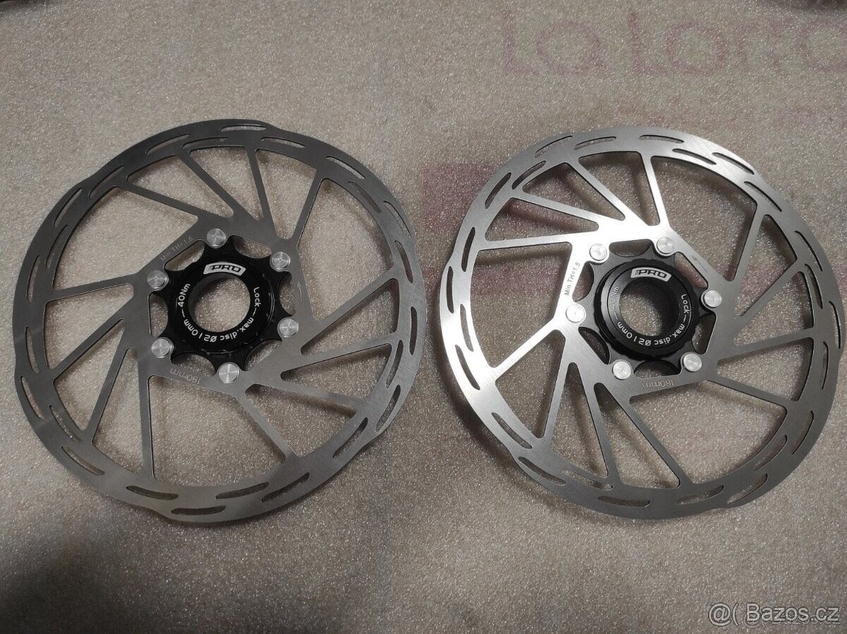 Spousta nových brzdových kotoučů 6 děr a CL. - 12