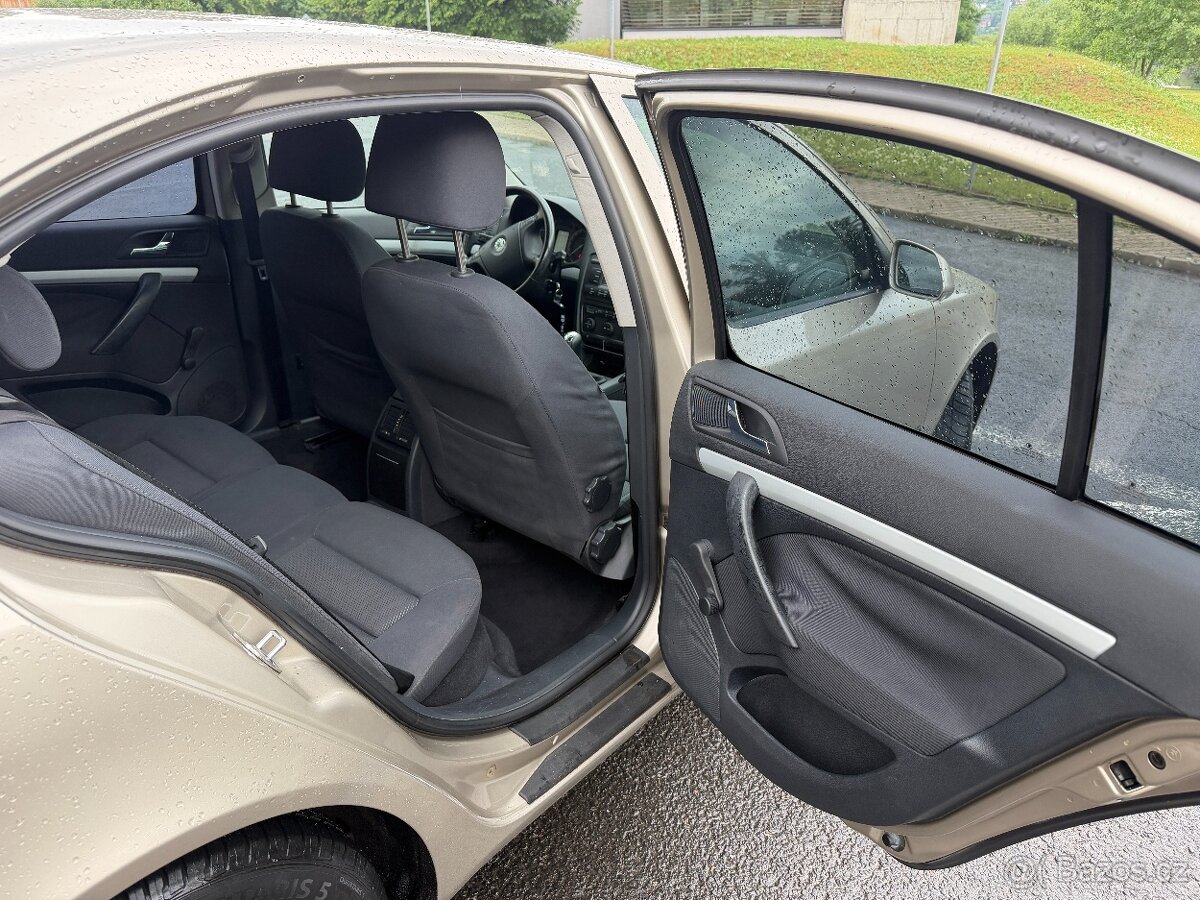 Škoda Octavia 1,6 85kw - NOVÁ STK - 12