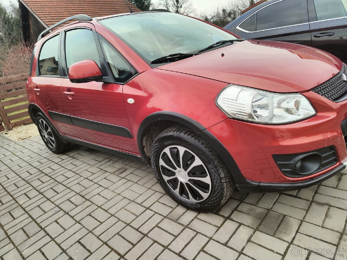 Prodám Suzuki Swift SX4 - 12