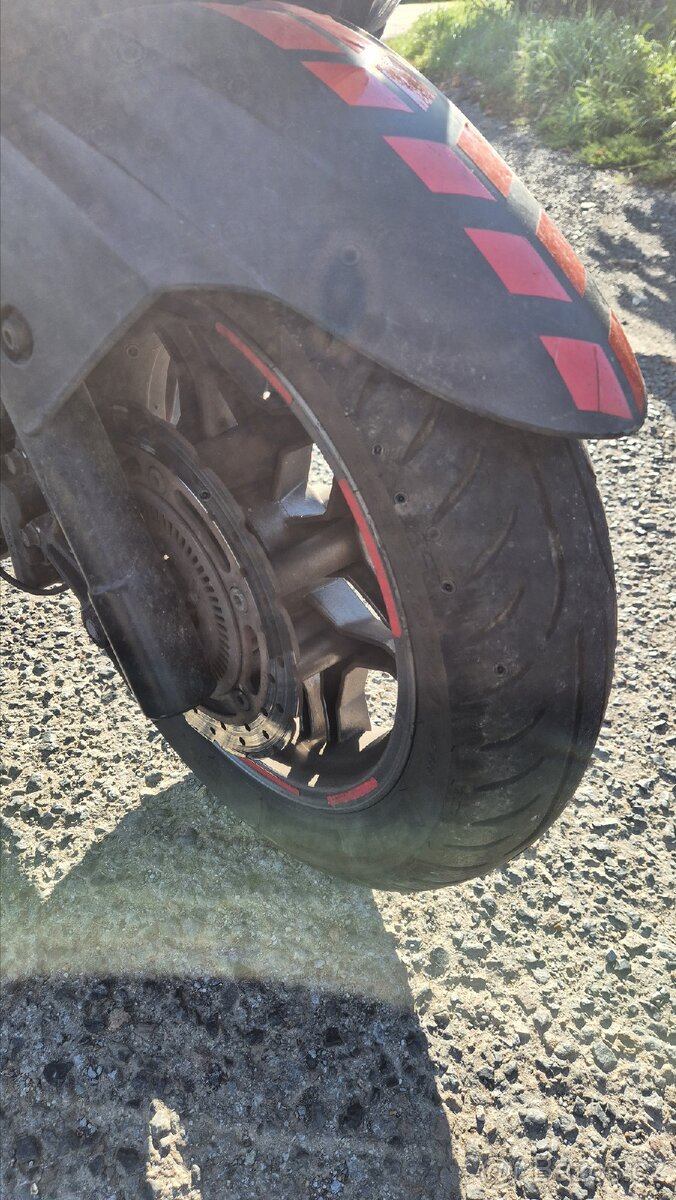 Kymco X-town 125i - 12