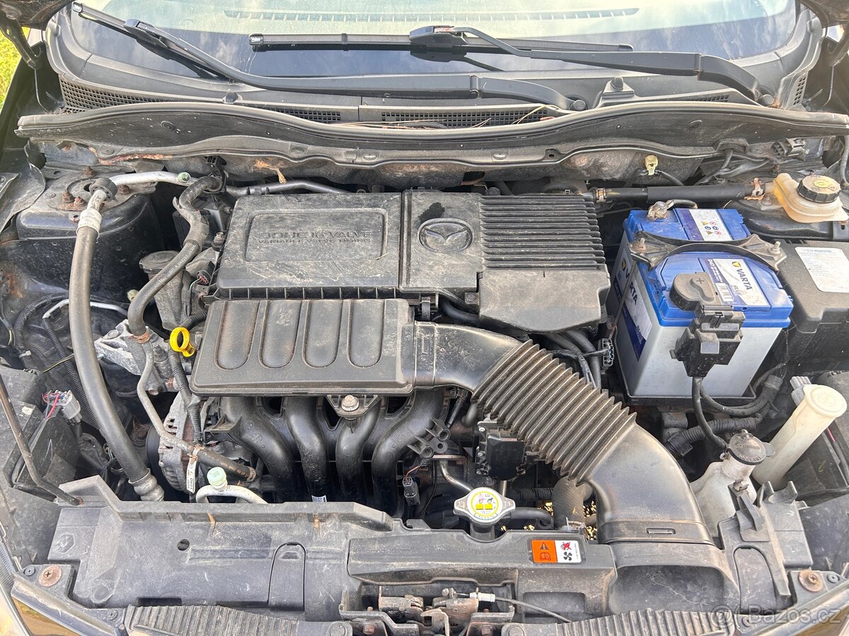 Mazda 2 1.3i - 12