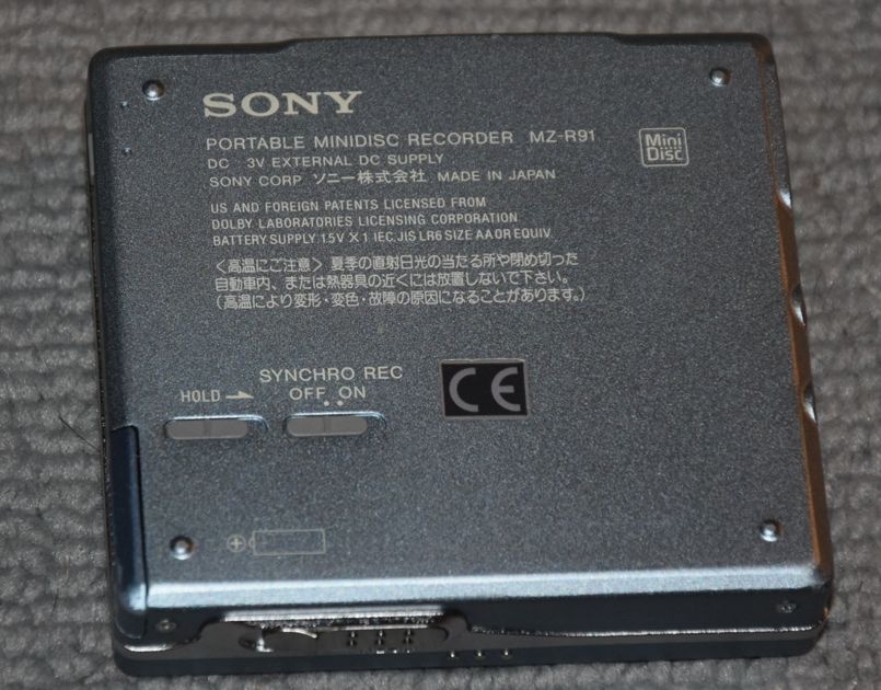 Minidisc Sony MZ-R91, manual, AA adapter, manual, MD disky - 12